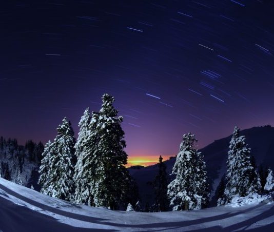 Incentive of sledding under clear winter night skies